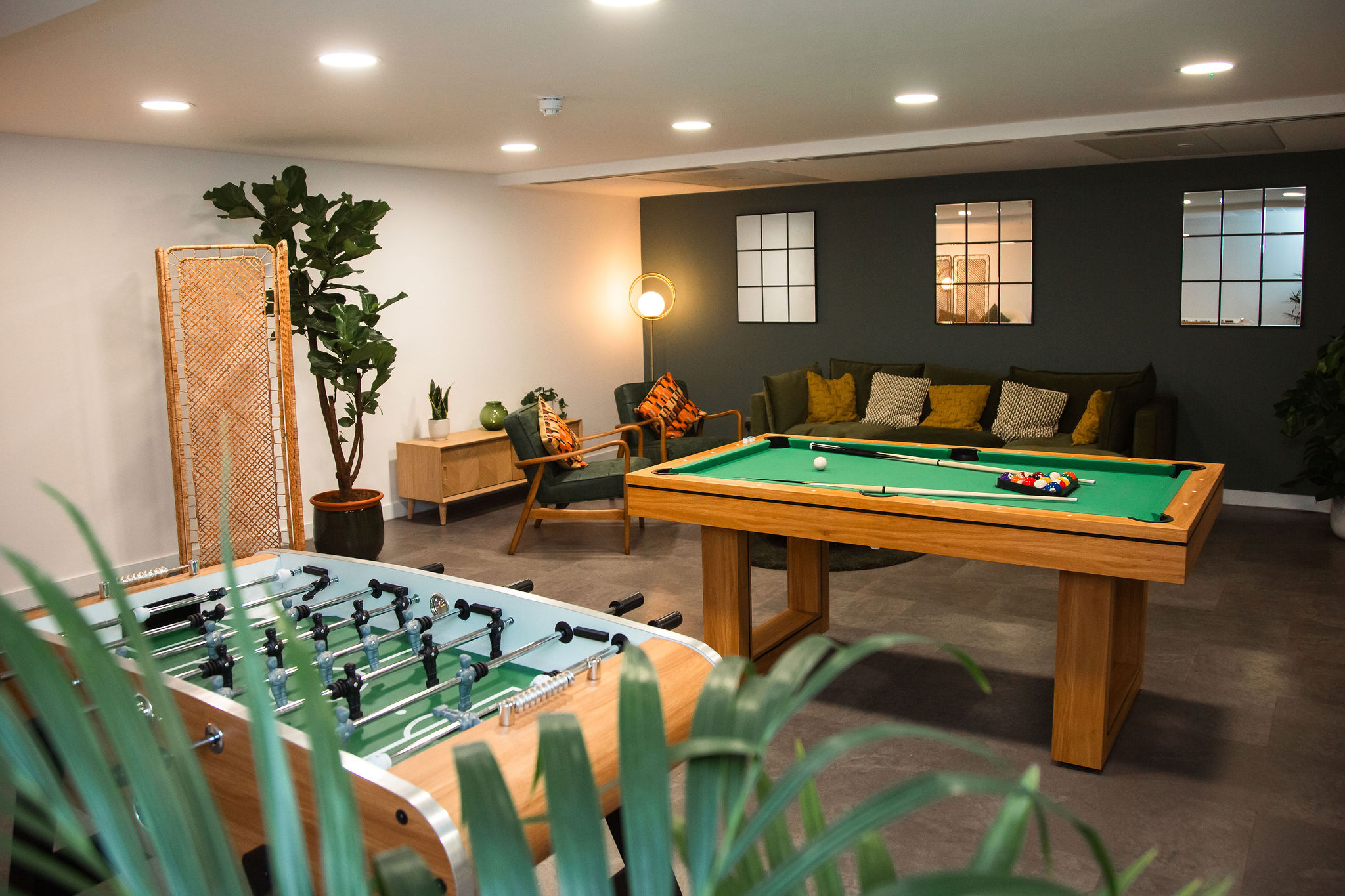 Hexagon Tower breakout area pool table and table football in modern breakout area