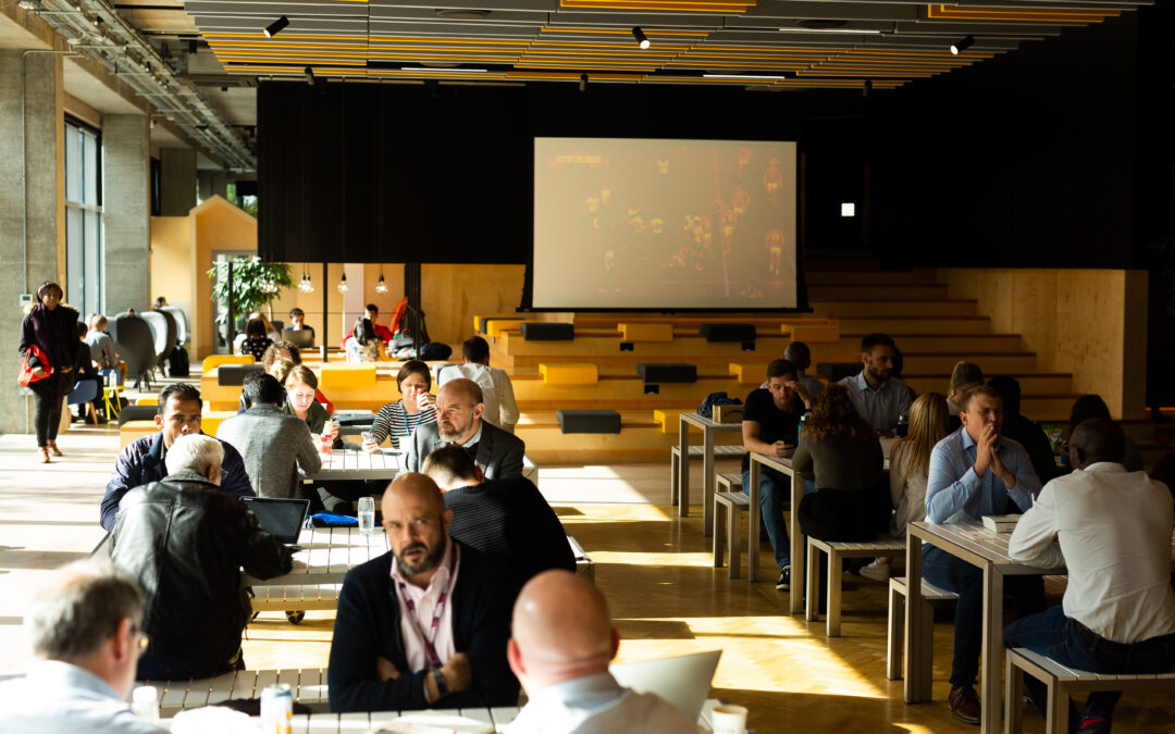 people sat on tables networking