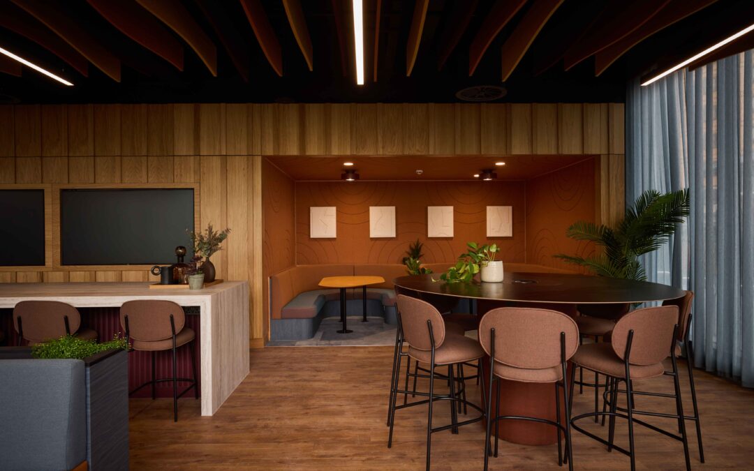 interior lobby of Citylabs 4.0 with table and stools, coworking desks and a breakout space with lounge seating