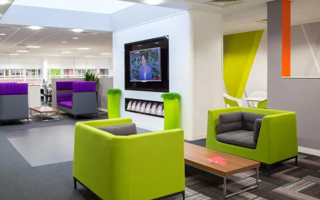 green breakout space sofas and purple sofas