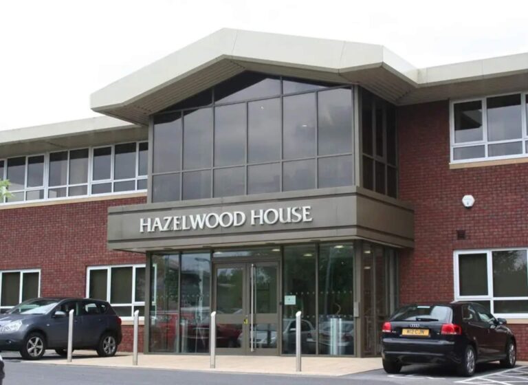 large office building with hazelwood house sign